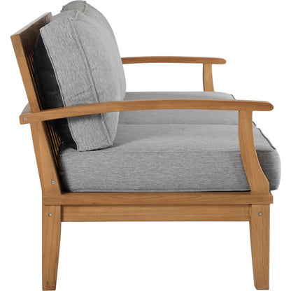 Andover Teak Sofa by Evans & Londeen. Made from density 22 foam in a coastal style.
