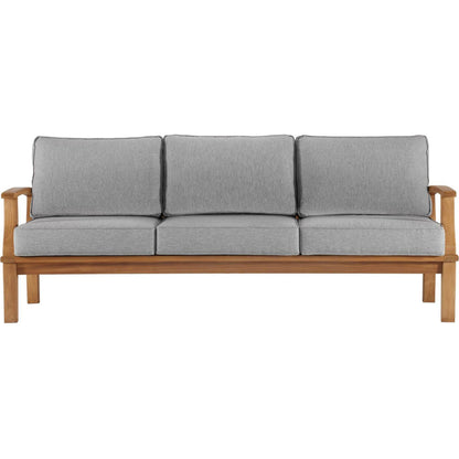 Andover Teak Sofa by Evans & Londeen. Made from density 22 foam in a coastal style.