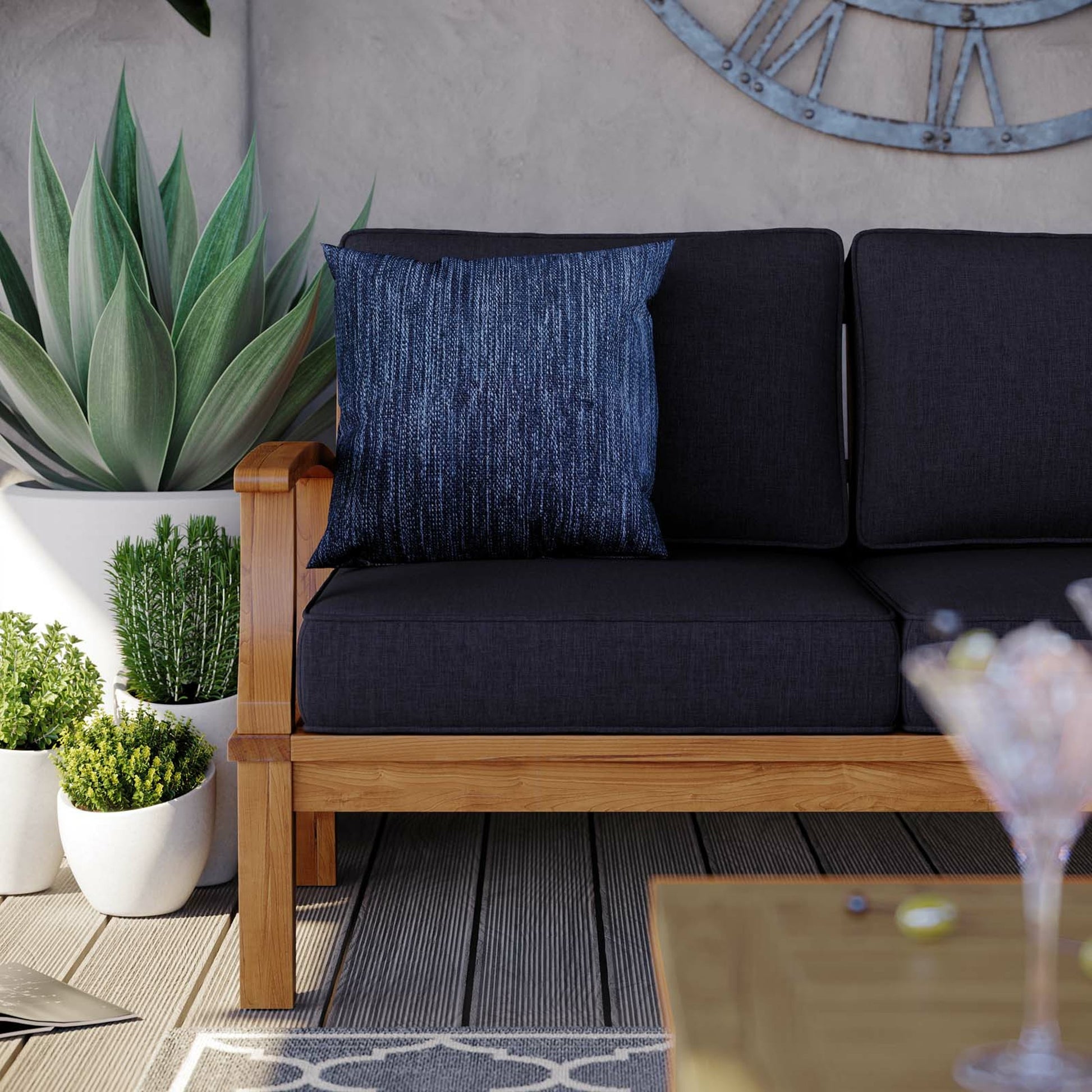 Andover Teak Sofa by Evans & Londeen. Made from density 22 foam in a coastal style.