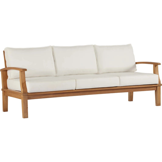 Andover Teak Sofa by Evans & Londeen. Made from density 22 foam in a coastal style.