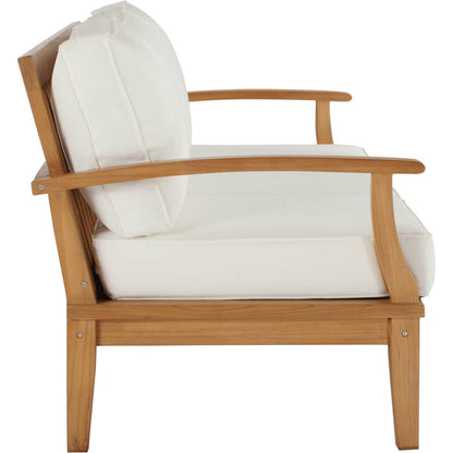 Andover Teak Sofa by Evans & Londeen. Made from density 22 foam in a coastal style.