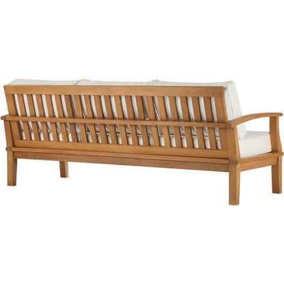 Andover Teak Sofa by Evans & Londeen. Made from density 22 foam in a coastal style.