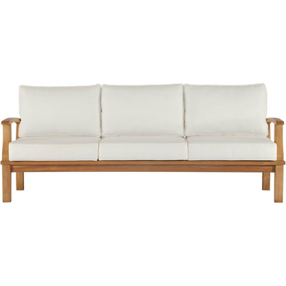 Andover Teak Sofa by Evans & Londeen. Made from density 22 foam in a coastal style.