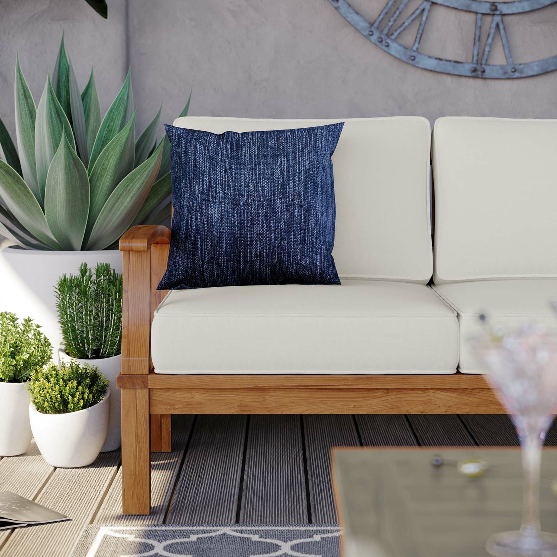Andover Teak Sofa by Evans & Londeen. Made from density 22 foam in a coastal style.