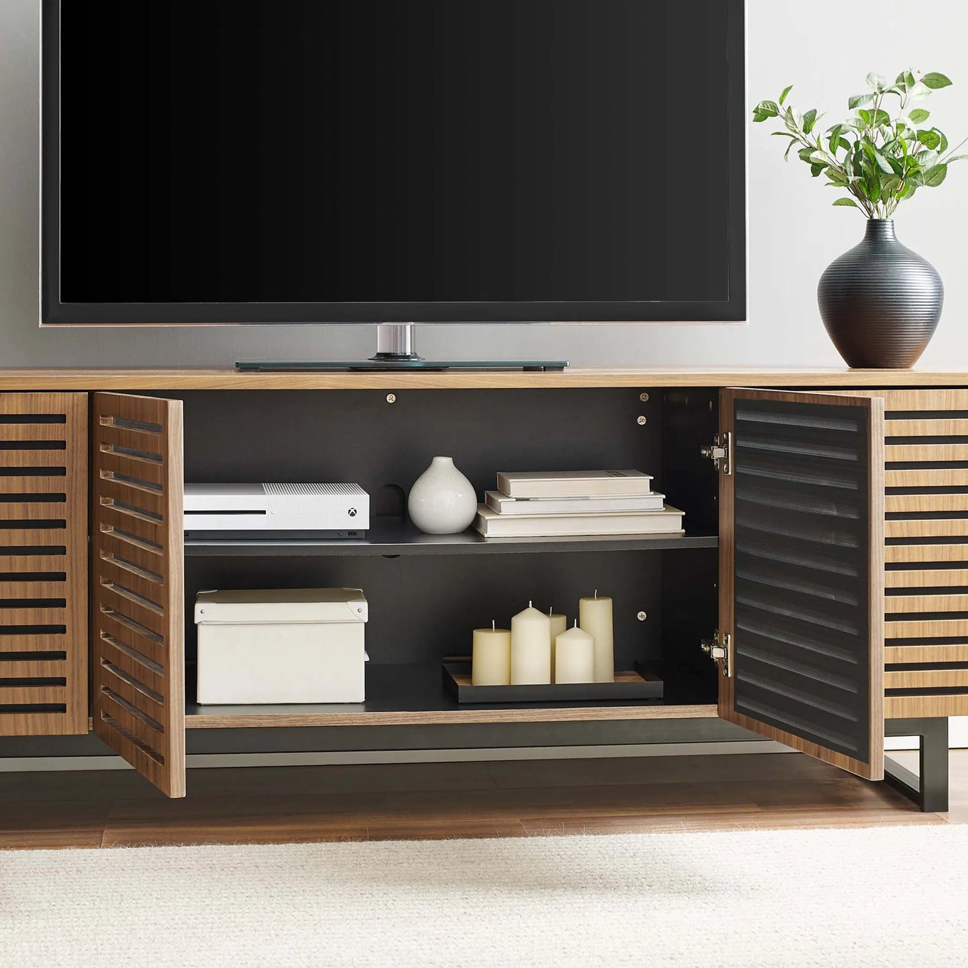 Henry 73" TV Stand by Evans & Londeen in walnut. Made from the body is 0.5in mdf with walnut wood veneer, legs is 40*20*1.2mm iron tube powder coated in black color in a modern style.
