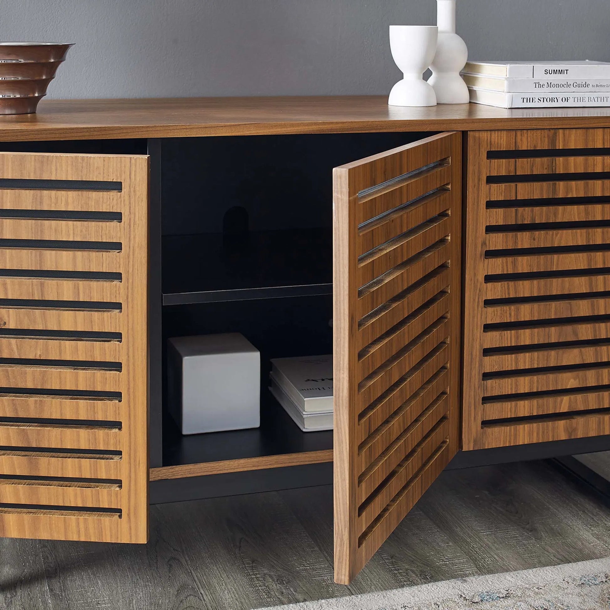 Henry 55" TV Stand by Evans & Londeen in walnut. Made from the body is 18mm mdf with walnut wood veneer, legs is 40*20*1.2mm iron tube powder coated in black color in a modern style.