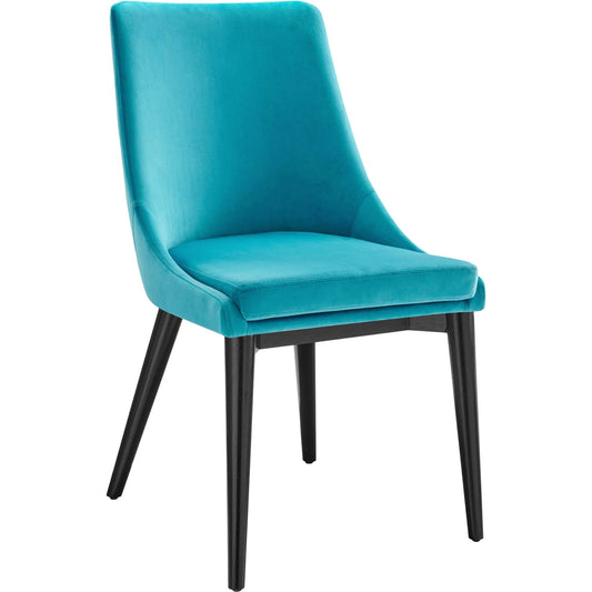Hewson Dining Chair by Evans & Londeen. Made from steel frame, plywood, foam, fabric, yuhua fabric, 100% polyester, solid wood, rubber wood legs in a modern style.