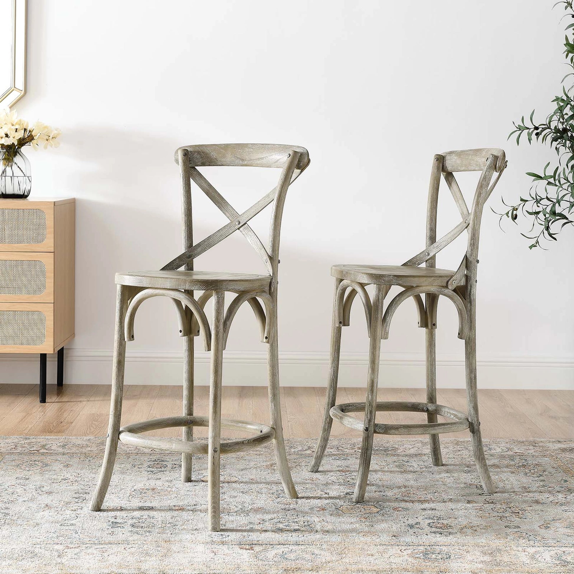 Easton Counter Stool by Evans & Londeen. Made from seat board is chinese elm wood, white foot pins in a transitional style.