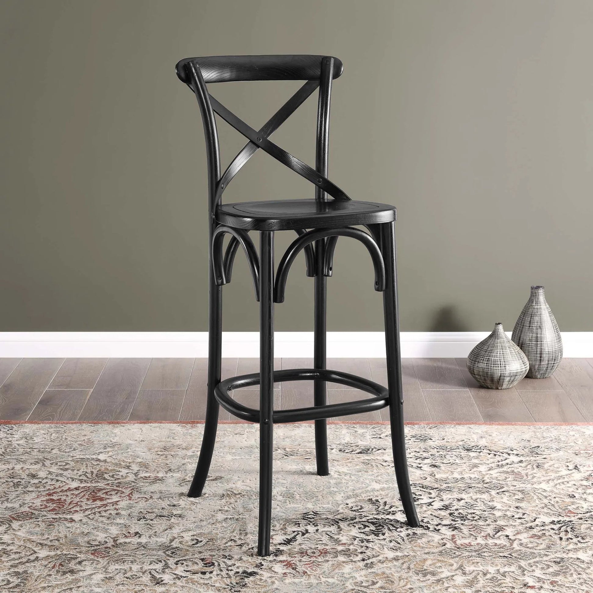 Easton Bar Stool by Evans & Londeen. Made from seat board is chinese elm wood, white foot pins in a transitional style.