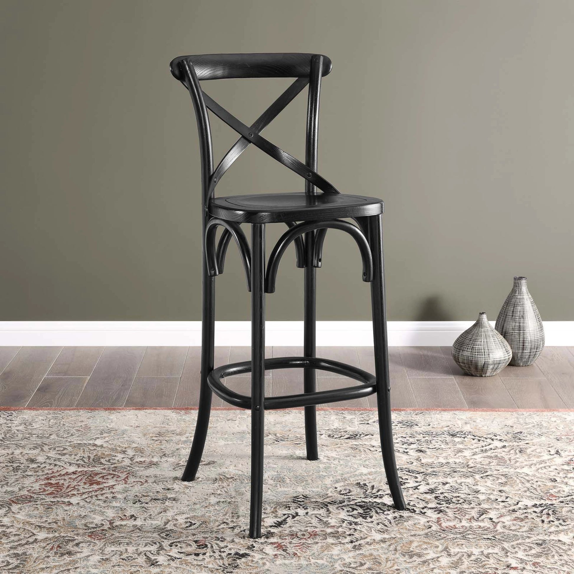 Easton Bar Stool by Evans & Londeen. Made from seat board is chinese elm wood, white foot pins in a transitional style.