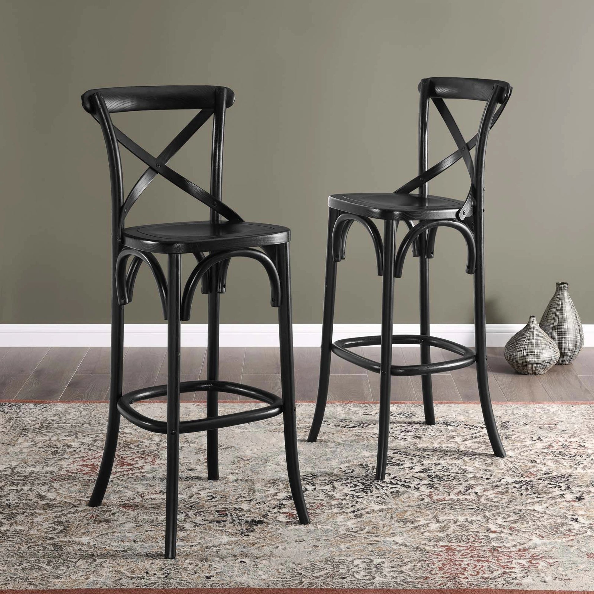 Easton Bar Stool by Evans & Londeen. Made from seat board is chinese elm wood, white foot pins in a transitional style.