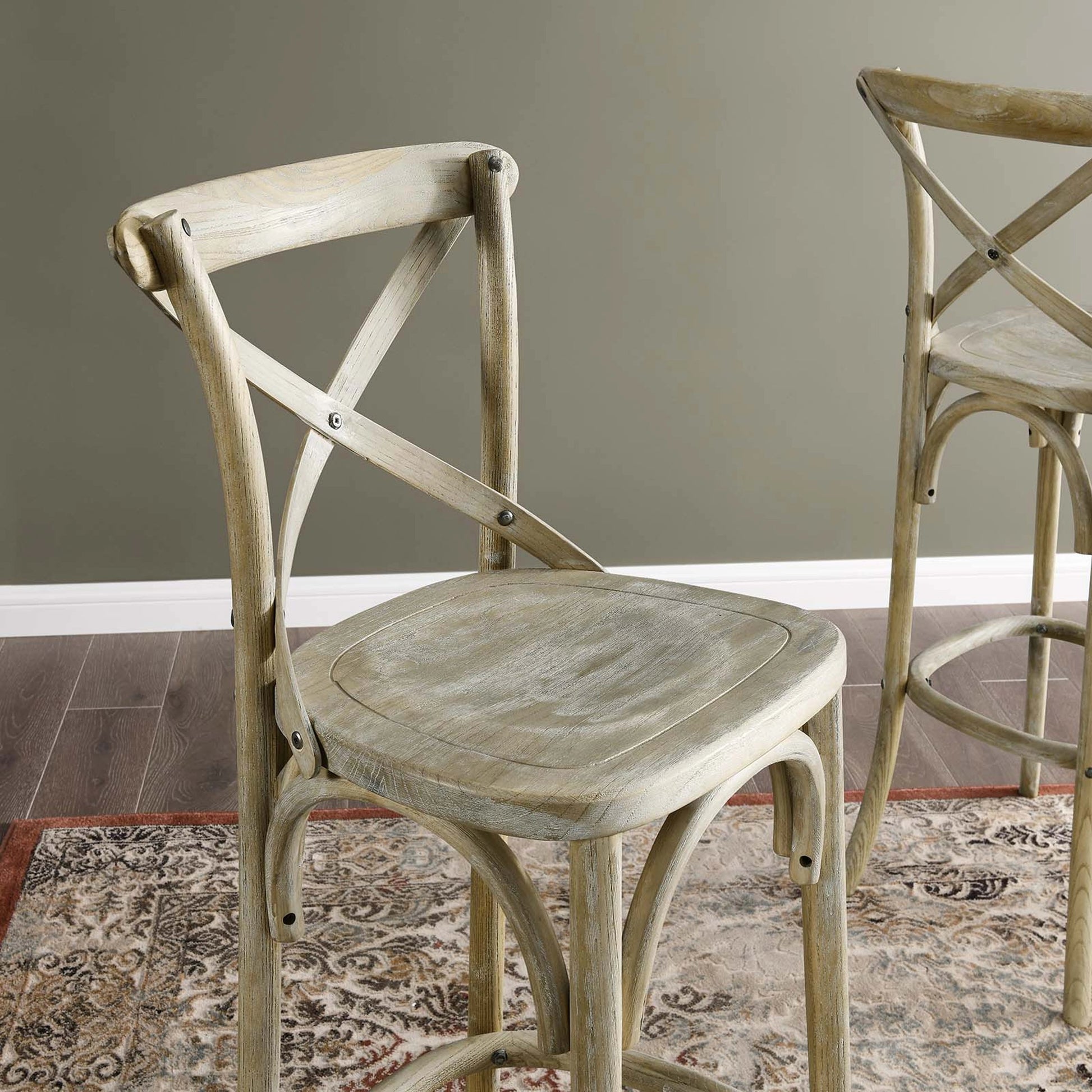 Easton Bar Stool by Evans & Londeen. Made from seat board is chinese elm wood, white foot pins in a transitional style.