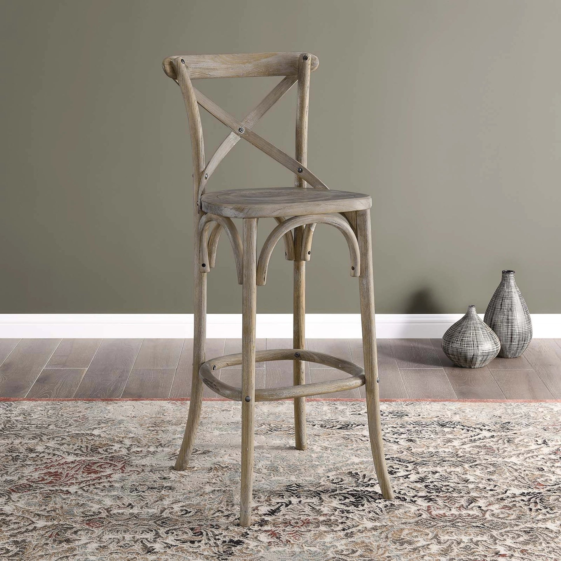 Easton Bar Stool by Evans & Londeen. Made from seat board is chinese elm wood, white foot pins in a transitional style.