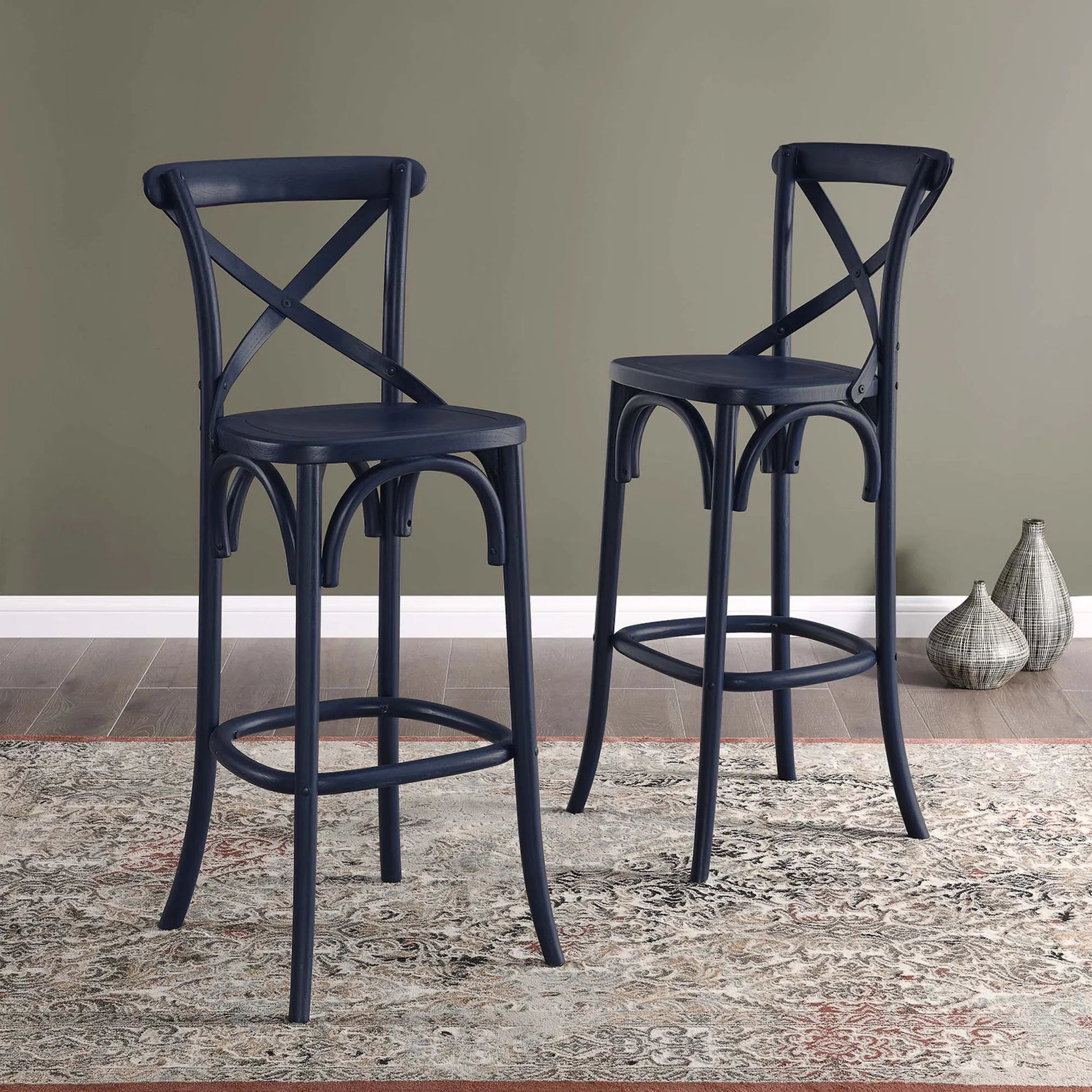 Easton Bar Stool by Evans & Londeen. Made from seat board is chinese elm wood, white foot pins in a transitional style.