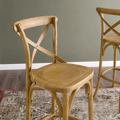 Easton Bar Stool by Evans & Londeen. Made from seat board is chinese elm wood, white foot pins in a transitional style.