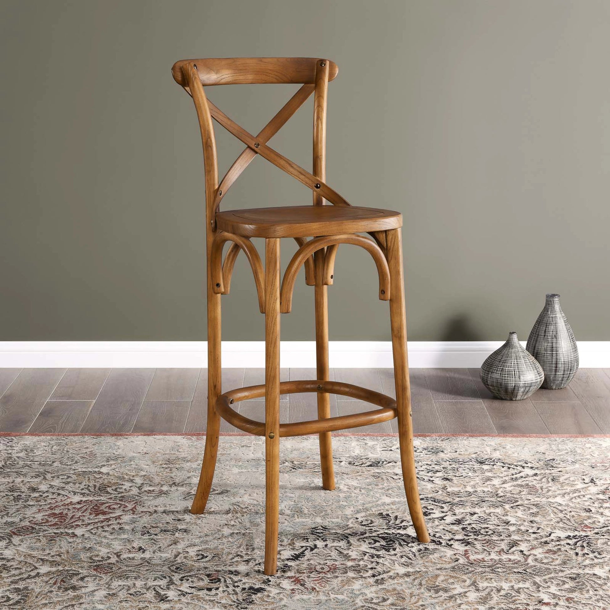 Easton Bar Stool by Evans & Londeen. Made from seat board is chinese elm wood, white foot pins in a transitional style.