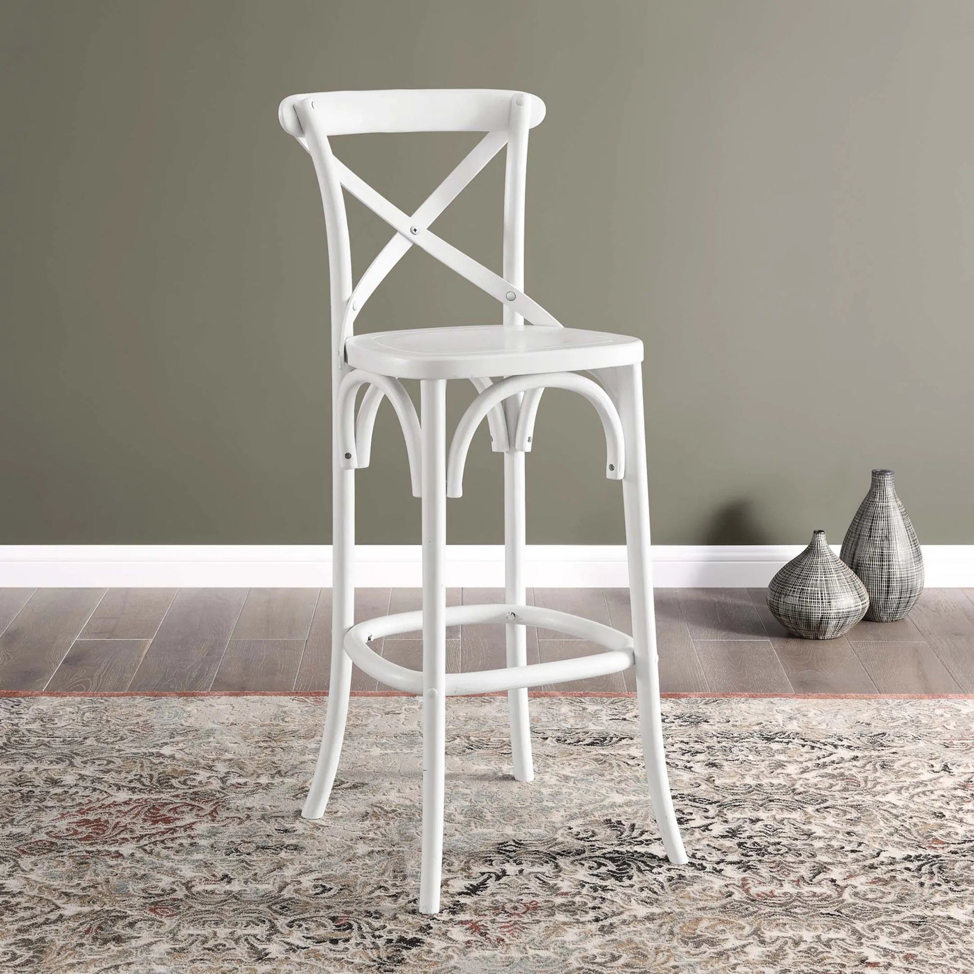 Easton Bar Stool by Evans & Londeen. Made from seat board is chinese elm wood, white foot pins in a transitional style.