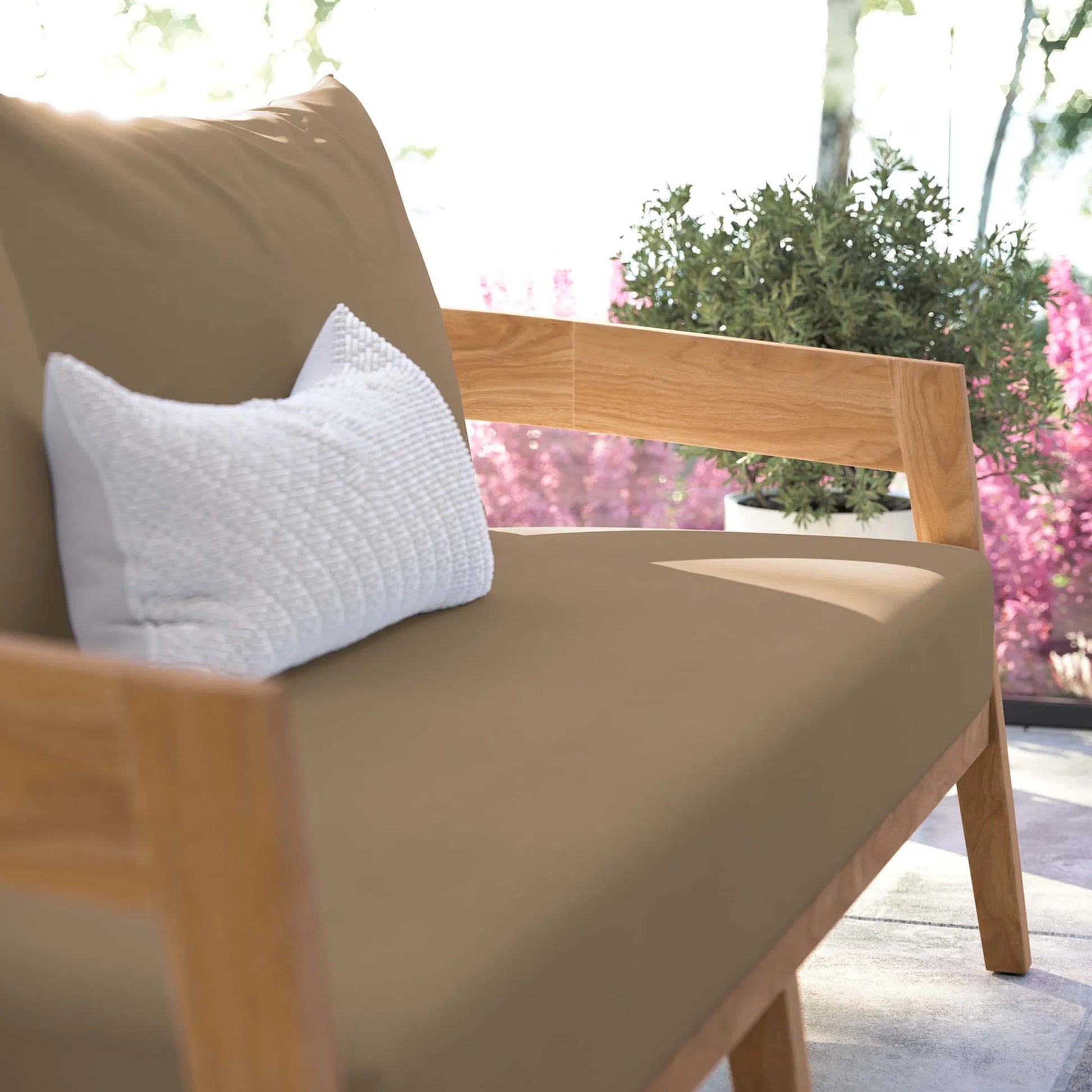 Hazelton Teak Wood Loveseat by Evans & Londeen. Made from teak wood, polyester, mesh sling, plastic tack glides, stainless steel in a modern style.