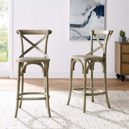 Easton Counter Stool by Evans & Londeen. Made from seat board: edge chinese elm wood, middle p2 plywood, top rattan, white foot pins in a transitional style.