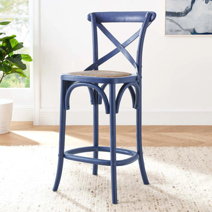 Easton Counter Stool by Evans & Londeen. Made from seat board: edge chinese elm wood, middle p2 plywood, top rattan, white foot pins in a transitional style.