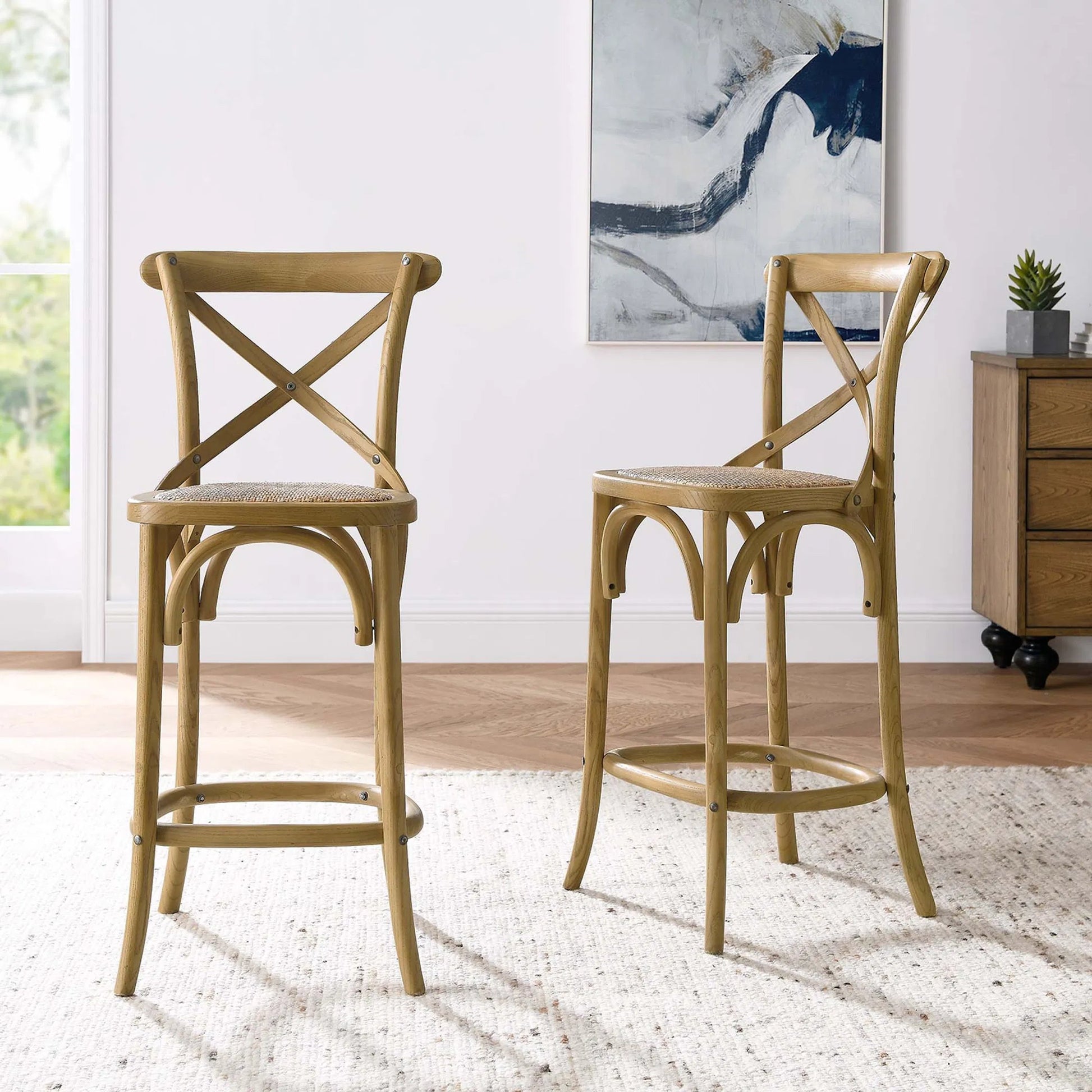 Easton Counter Stool by Evans & Londeen. Made from seat board: edge chinese elm wood, middle p2 plywood, top rattan, white foot pins in a transitional style.