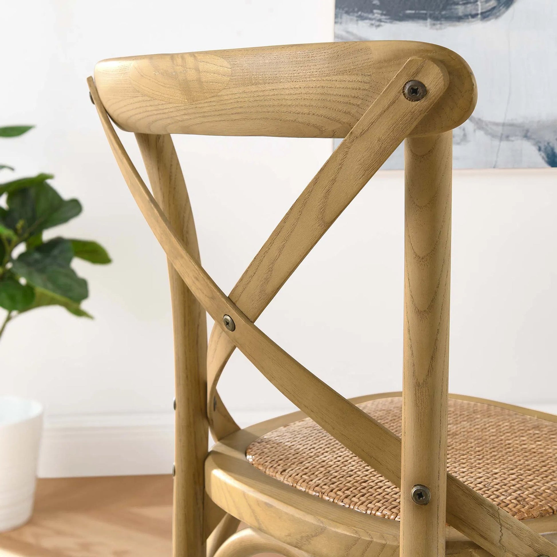Easton Counter Stool by Evans & Londeen. Made from seat board: edge chinese elm wood, middle p2 plywood, top rattan, white foot pins in a transitional style.