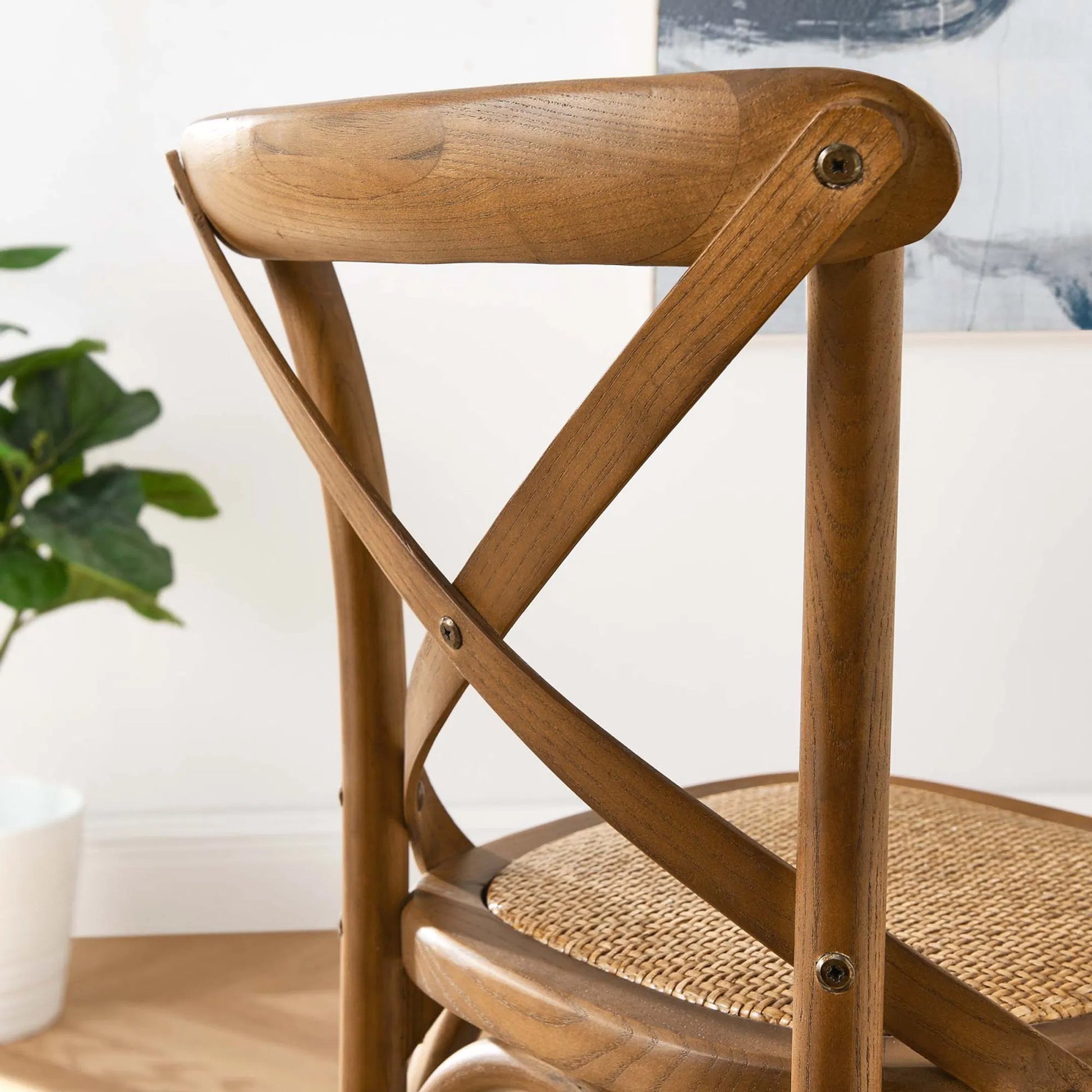 Easton Counter Stool by Evans & Londeen. Made from seat board: edge chinese elm wood, middle p2 plywood, top rattan, white foot pins in a transitional style.