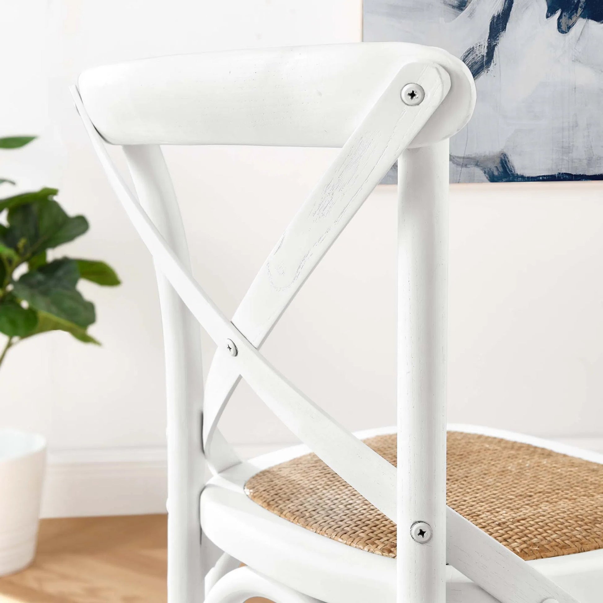 Easton Counter Stool by Evans & Londeen. Made from seat board: edge chinese elm wood, middle p2 plywood, top rattan, white foot pins in a transitional style.