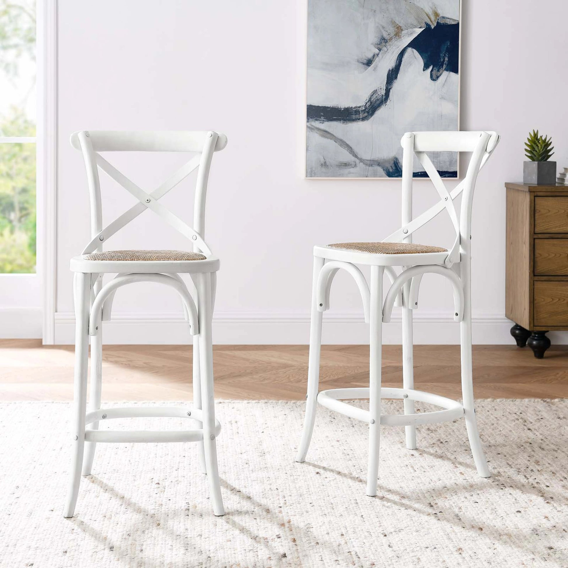 Easton Counter Stool by Evans & Londeen. Made from seat board: edge chinese elm wood, middle p2 plywood, top rattan, white foot pins in a transitional style.