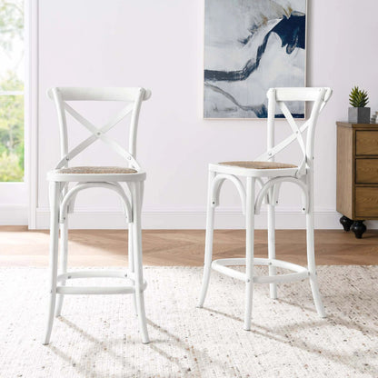 Easton Counter Stool by Evans & Londeen. Made from seat board: edge chinese elm wood, middle p2 plywood, top rattan, white foot pins in a transitional style.