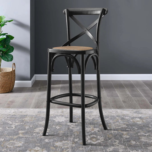 Easton Bar Stool by Evans & Londeen. Made from edge chinese elm wood, middle p2 plywood, top rattan, white foot pins in a cottage & farmhouse style.