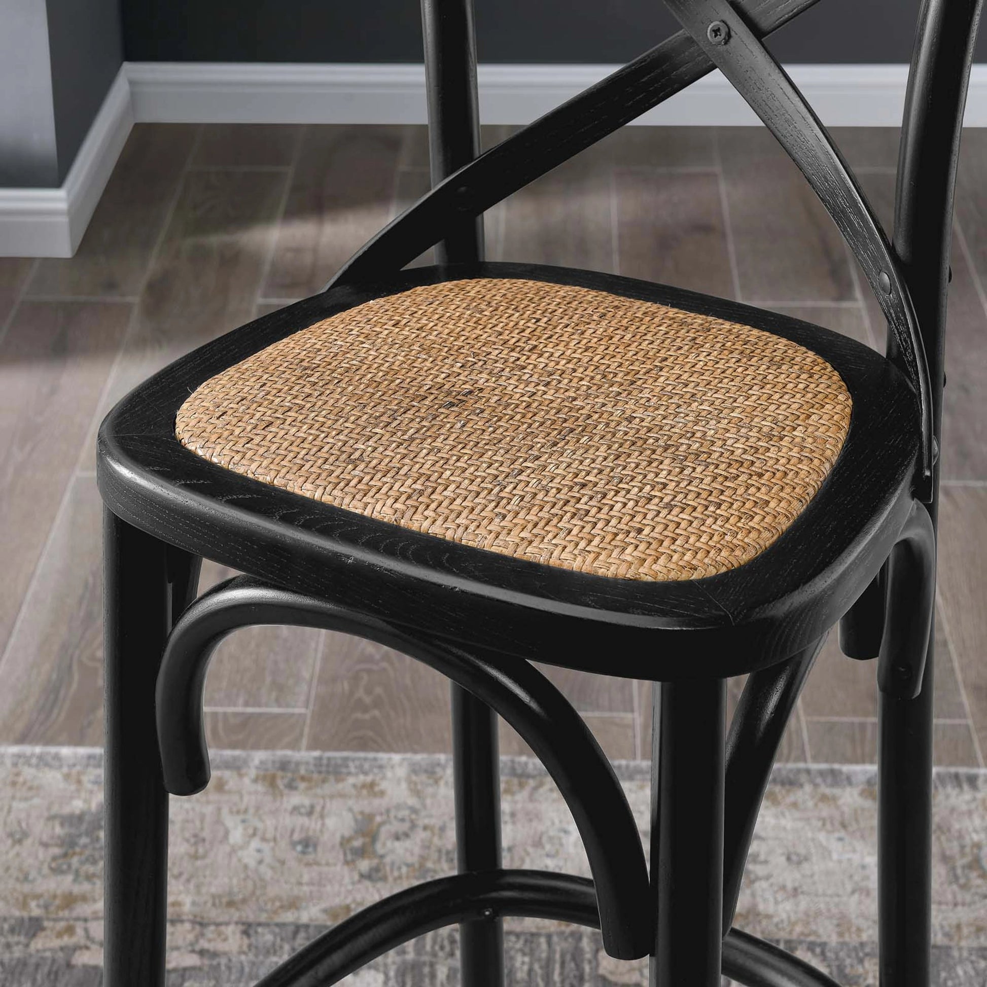 Easton Bar Stool by Evans & Londeen. Made from edge chinese elm wood, middle p2 plywood, top rattan, white foot pins in a cottage & farmhouse style.