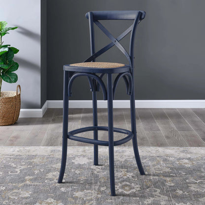 Easton Bar Stool by Evans & Londeen. Made from edge chinese elm wood, middle p2 plywood, top rattan, white foot pins in a cottage & farmhouse style.