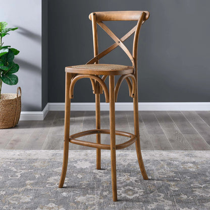 Easton Bar Stool by Evans & Londeen. Made from edge chinese elm wood, middle p2 plywood, top rattan, white foot pins in a cottage & farmhouse style.