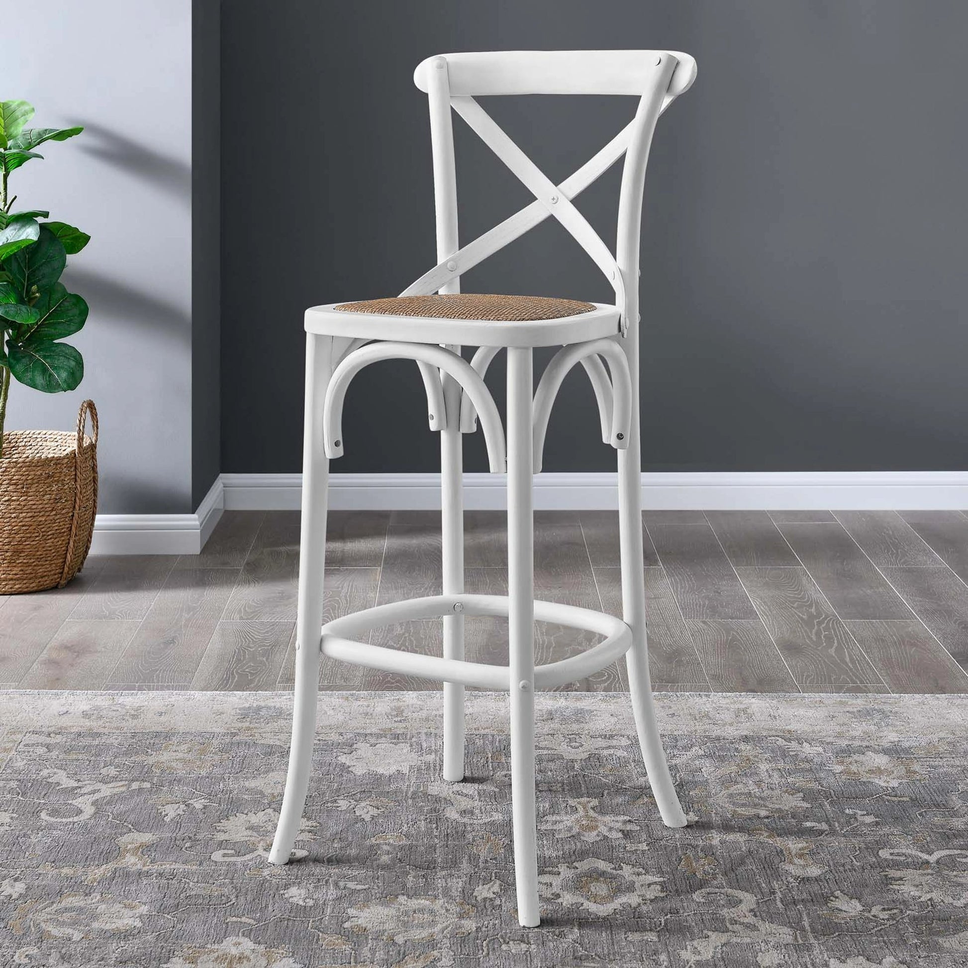 Easton Bar Stool by Evans & Londeen. Made from edge chinese elm wood, middle p2 plywood, top rattan, white foot pins in a cottage & farmhouse style.