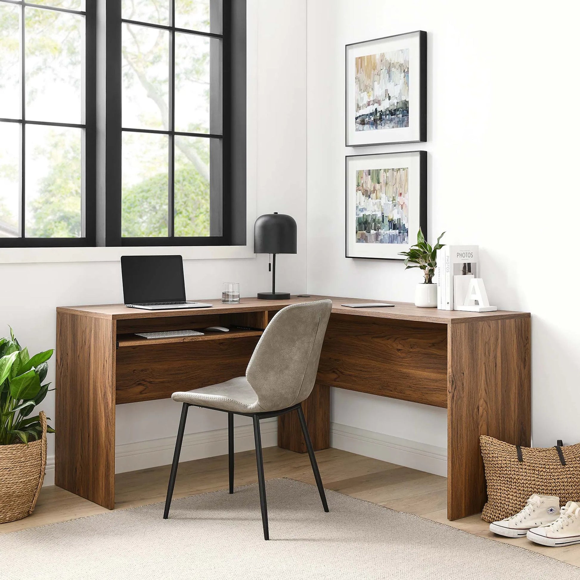 Nicholas L-Shaped Wood Office Desk by Evans & Londeen in walnut. Made from particle board, mdf, engineering wood with straight profile, pp toppan walnut, paper lamination, keyboard tray, tray runner, grommet cover, weight capacity: 150