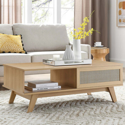 Oldham Coffee Table by Evans & Londeen. Made from particle board, paper, mdf, rattan, weight capacity: top panel : 189 lbs, bottom panel : 44 lbs in a modern style.