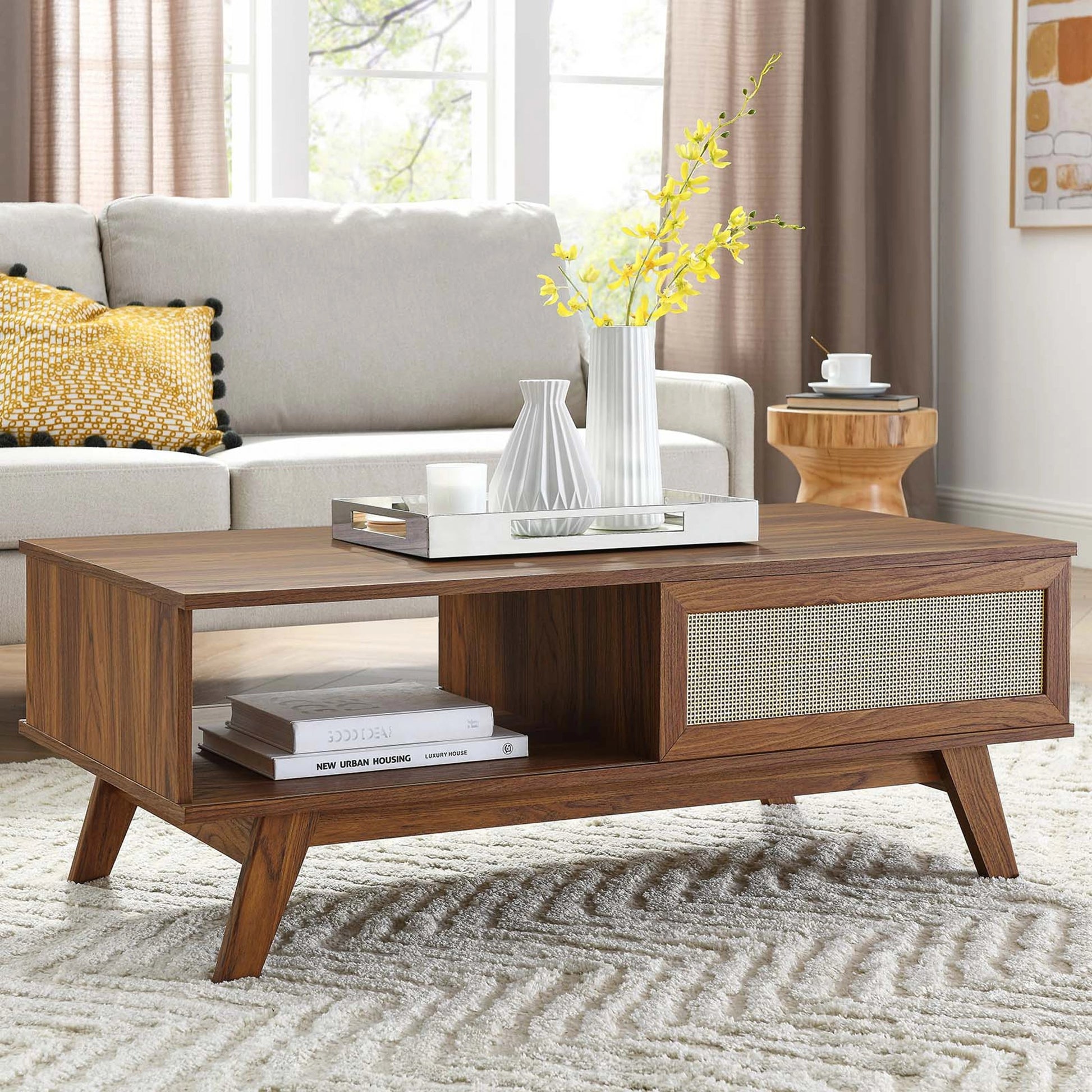 Oldham Coffee Table by Evans & Londeen. Made from particle board, paper, mdf, rattan, weight capacity: top panel : 189 lbs, bottom panel : 44 lbs in a modern style.