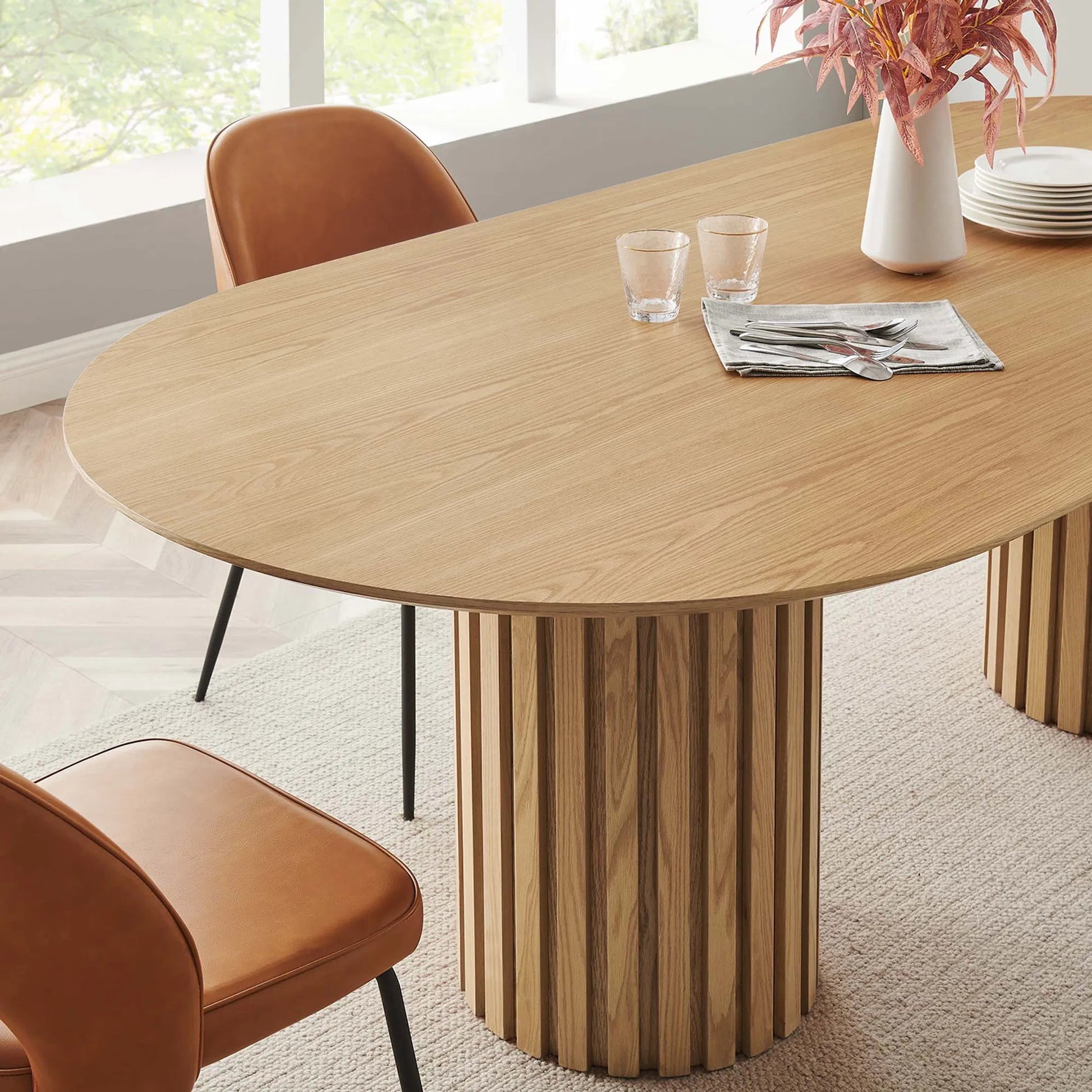 Fairbanks 95" Oval Dining Table by Evans & Londeen. Made from p2 mdf panel, american walut veneer color code: wa-01, bottom of both base is with 1 whole piece of 3mmt felt pad in a modern style.
