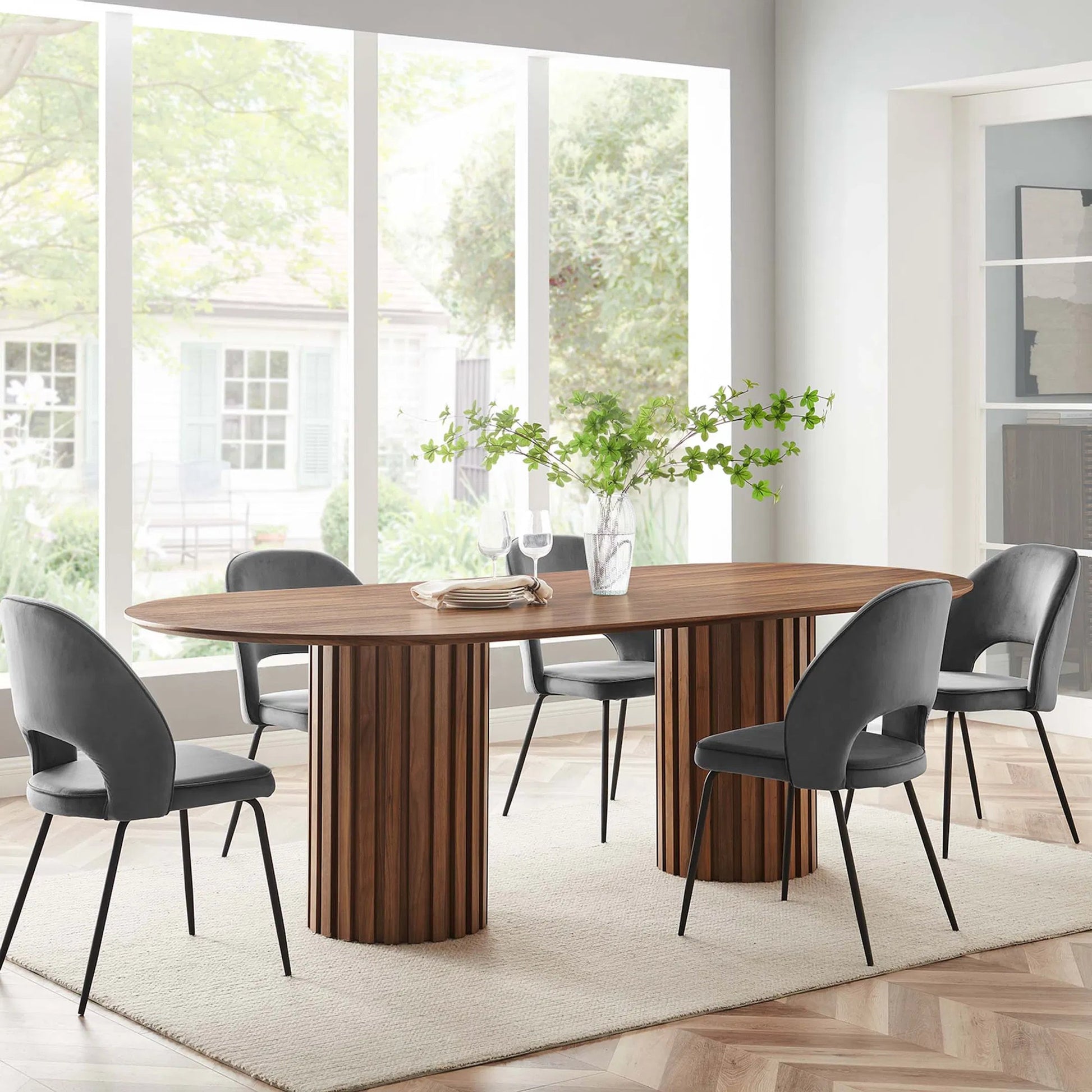 Fairbanks 95" Oval Dining Table by Evans & Londeen. Made from p2 mdf panel, american walut veneer color code: wa-01, bottom of both base is with 1 whole piece of 3mmt felt pad in a modern style.