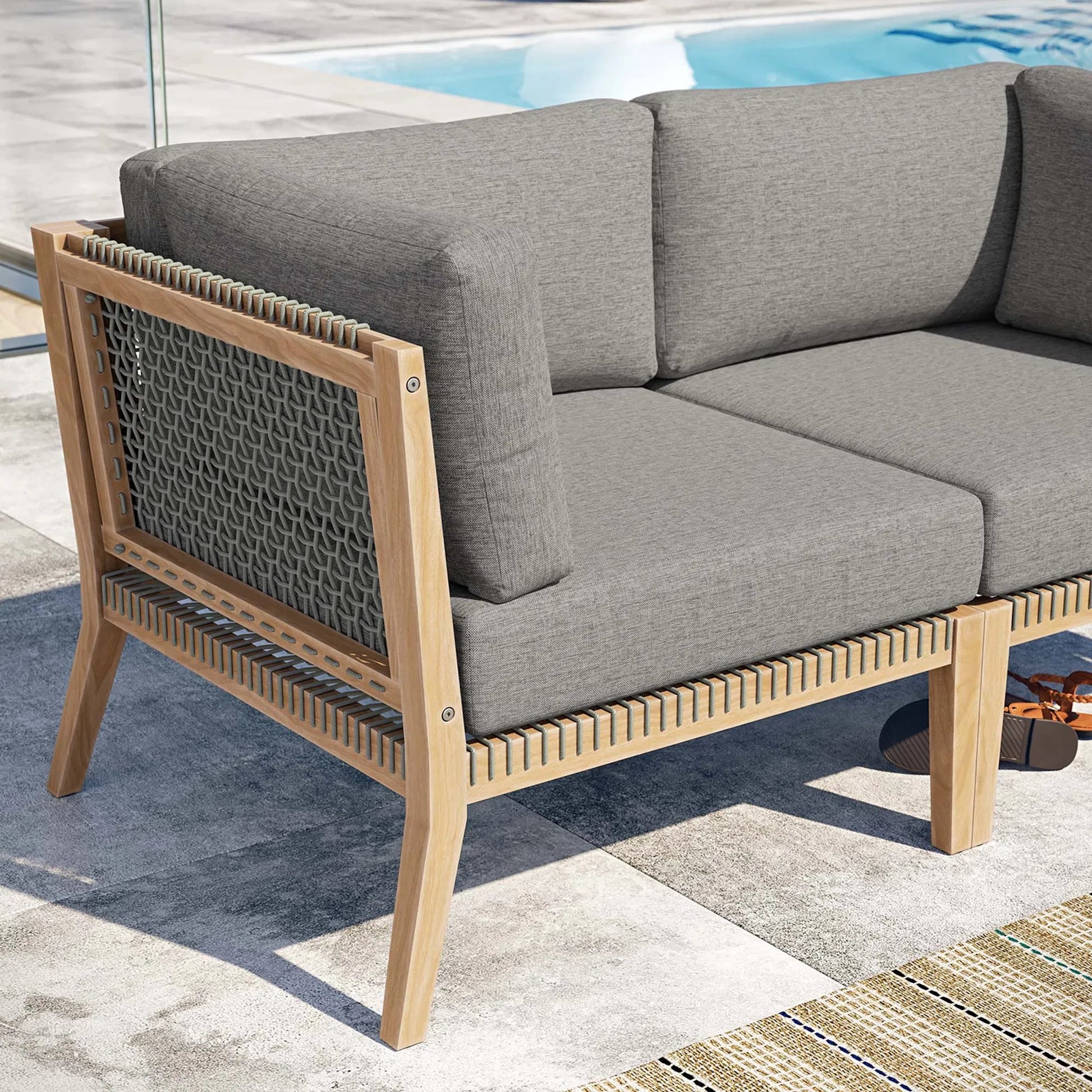 Cooper Teak Wood Loveseat by Evans & Londeen. Made from teak wood, rope, quick dry foam, tack glides, chair weight capacity: 226kgs. in a modern style.