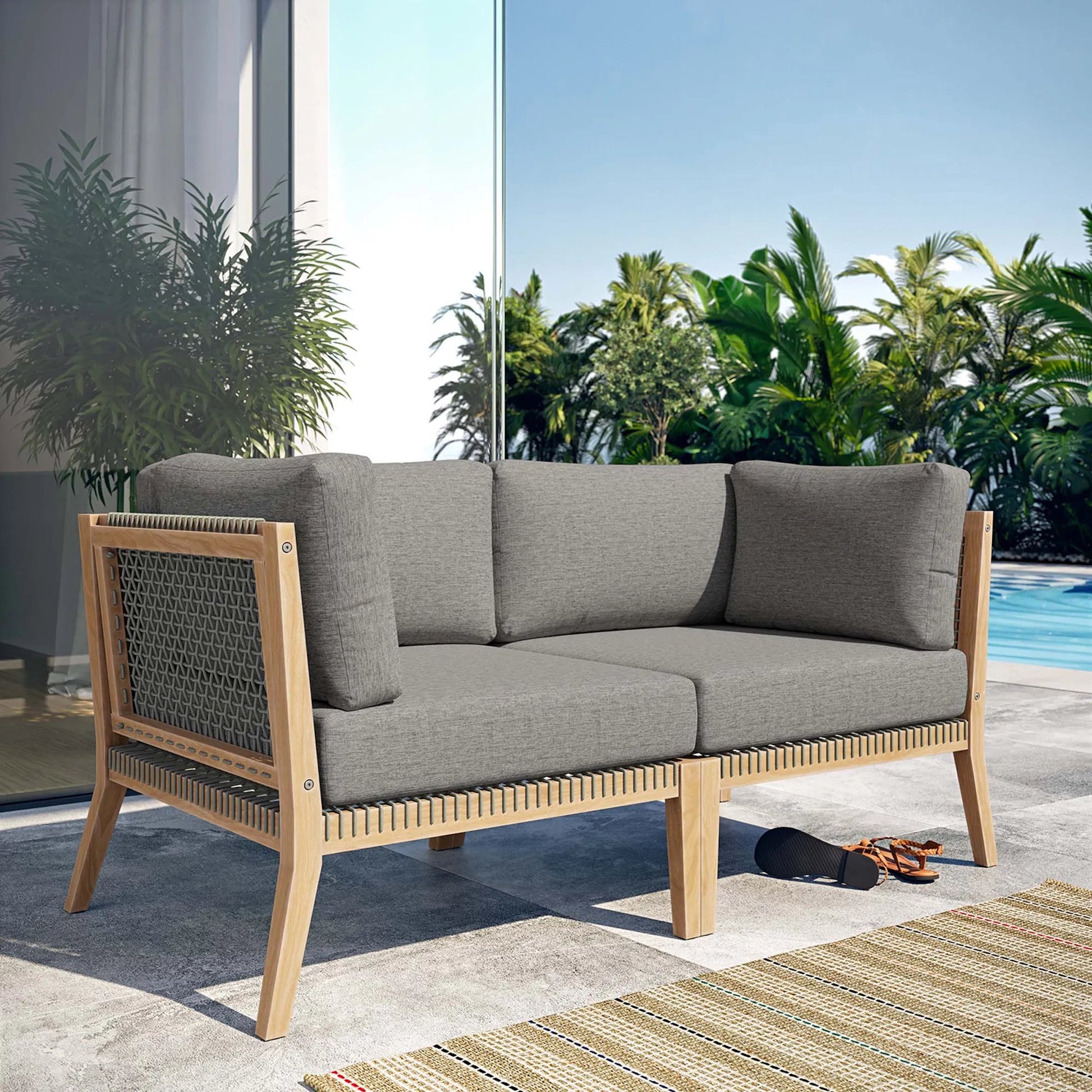 Cooper Teak Wood Loveseat by Evans & Londeen. Made from teak wood, rope, quick dry foam, tack glides, chair weight capacity: 226kgs. in a modern style.