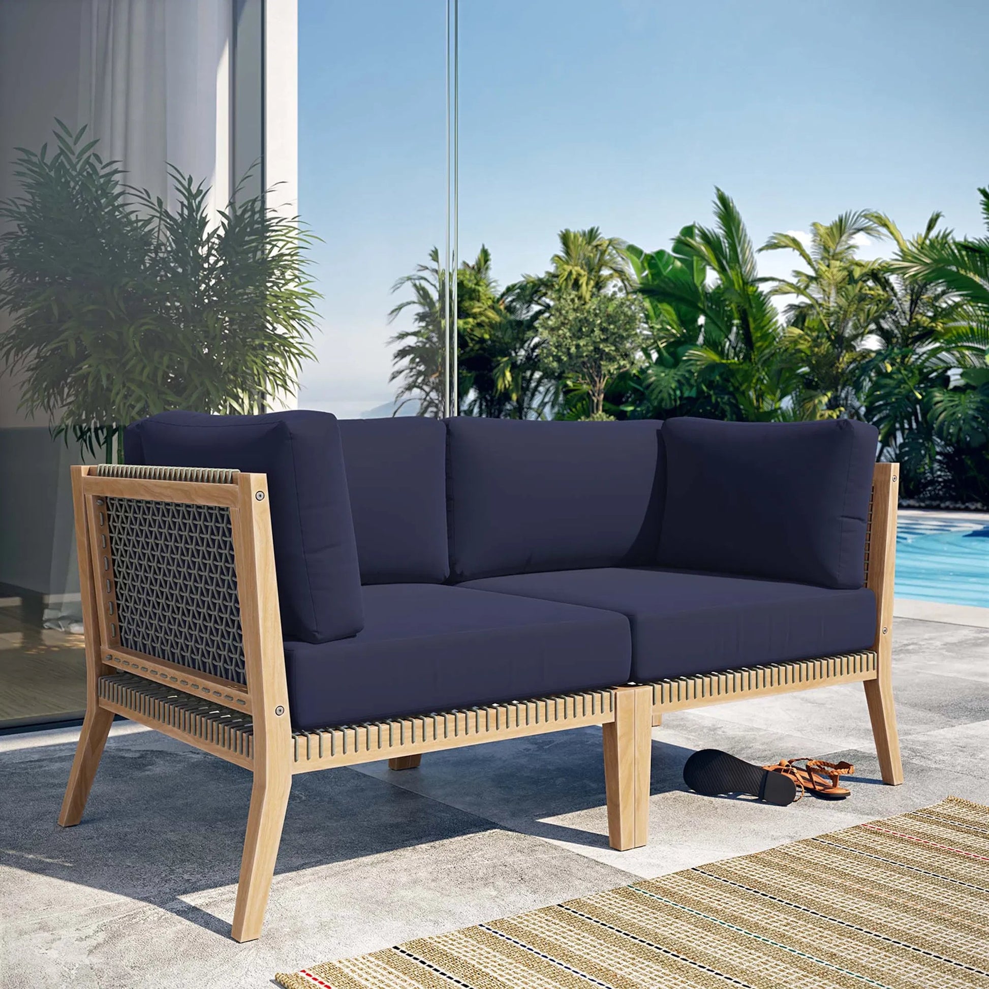 Cooper Teak Wood Loveseat by Evans & Londeen. Made from teak wood, rope, quick dry foam, tack glides, chair weight capacity: 226kgs. in a modern style.