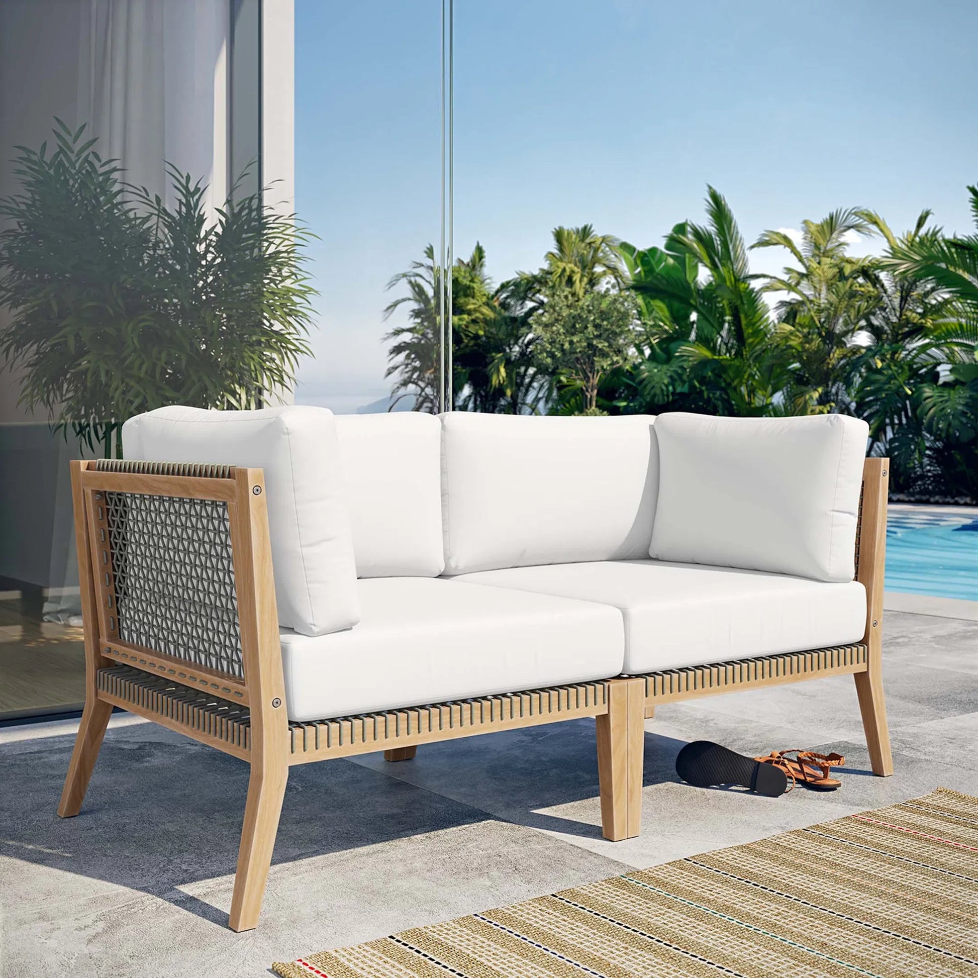 Cooper Teak Wood Loveseat by Evans & Londeen. Made from teak wood, rope, quick dry foam, tack glides, chair weight capacity: 226kgs. in a modern style.