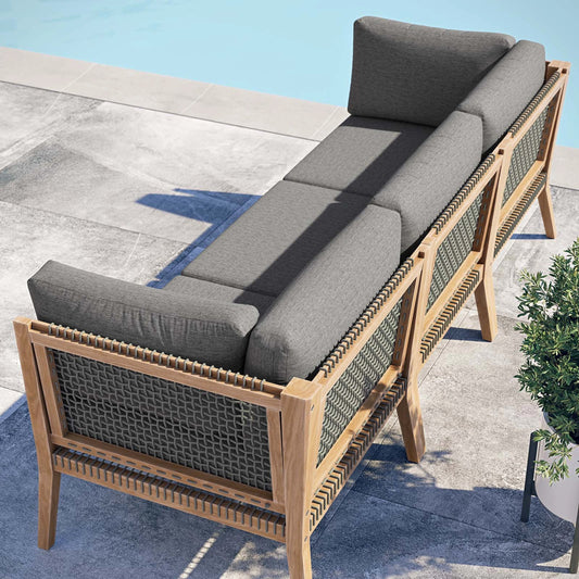 Cooper Teak Wood Sofa by Evans & Londeen. Made from teak wood, rope, quick dry foam, tack glides in a modern style.