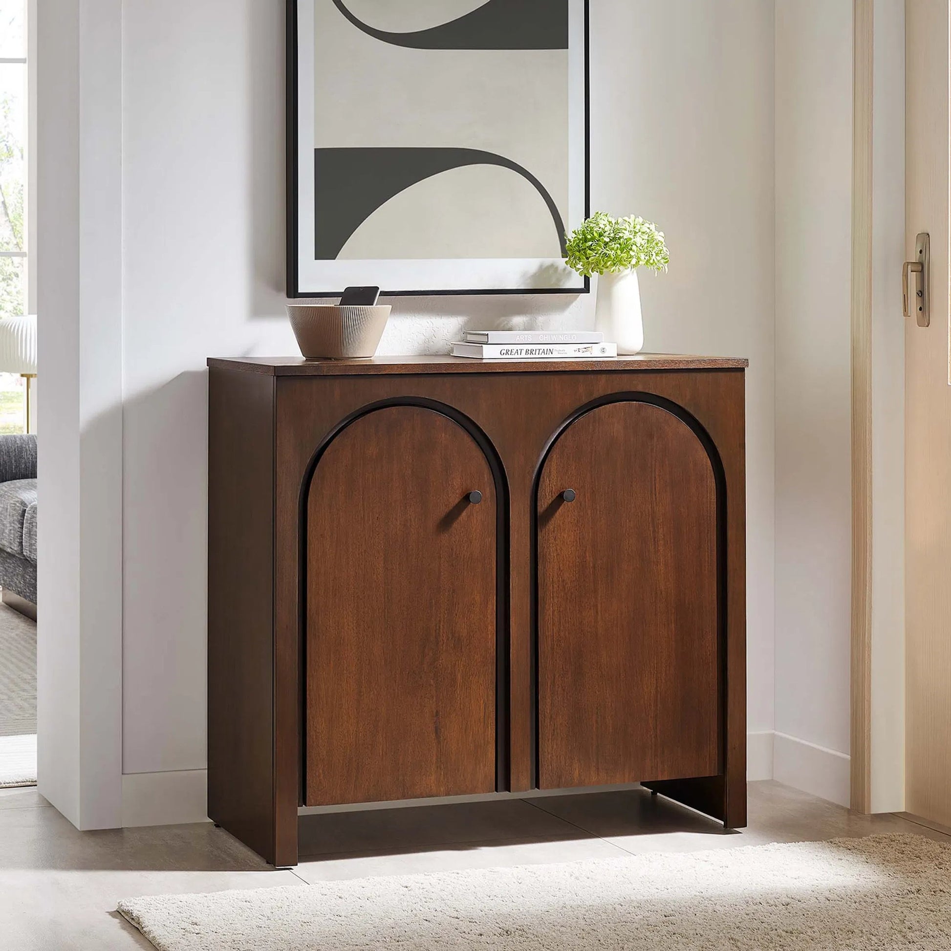 Osceola 2-Door Arched Door Storage Cabinet by Evans & Londeen in walnut. Made from unique in a transitional style.