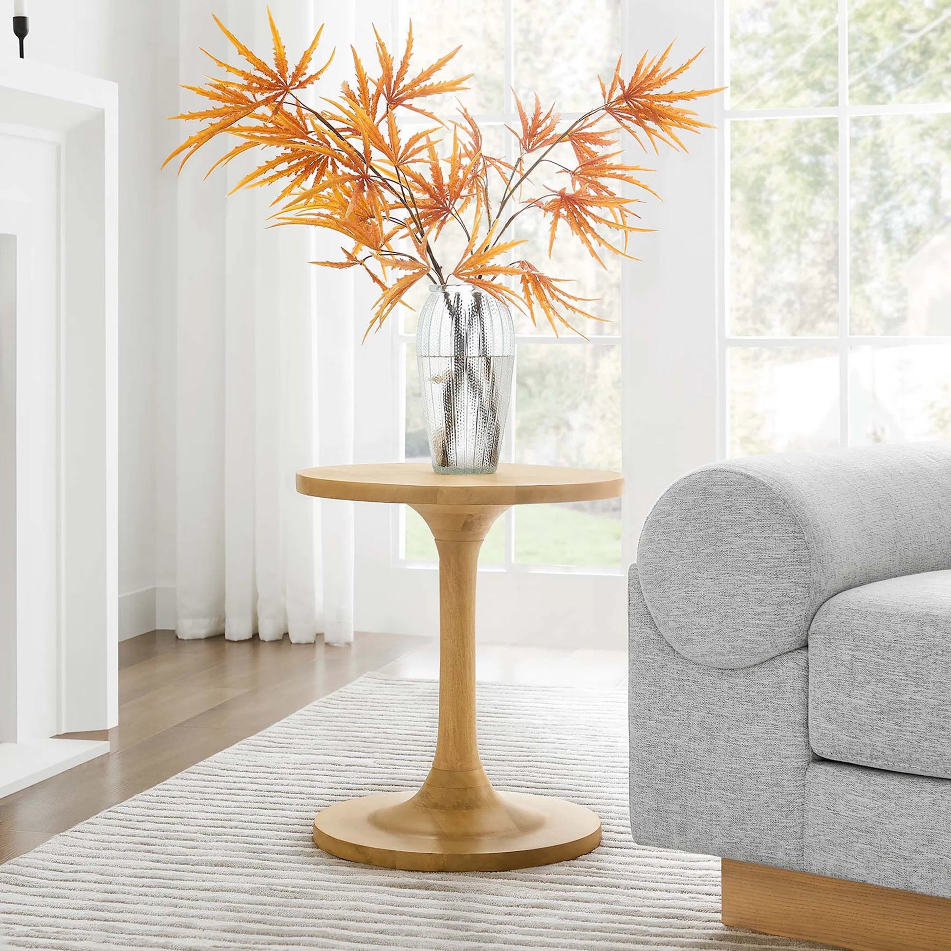 Allodium Round Wood Side Table by Evans & Londeen in walnut. Made from wood in a modern style.