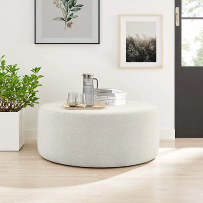 Ionia 38" Round Woven Heathered Ottoman by Evans & Londeen. Made from unique in a modern style.