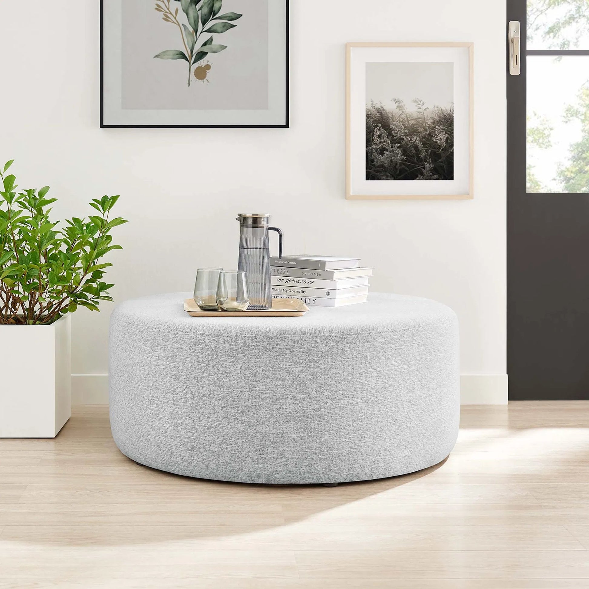Ionia 38" Round Woven Heathered Ottoman by Evans & Londeen. Made from unique in a modern style.