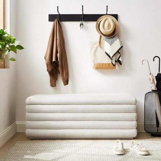 Owen Boucle Storage Bench by Evans & Londeen in cloud. Made from boucle upholstered in a unique style.